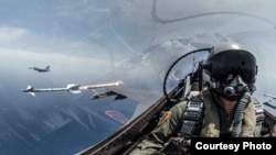 资料照:2019年5月22日台湾海空联合操演,F-16战机发射响尾蛇导弹射击模拟目标。