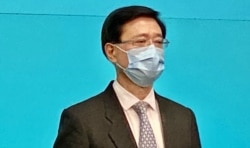李家超成为香港历史上首位警察背景官员,升任政务司司长 (美国之音/汤惠芸)