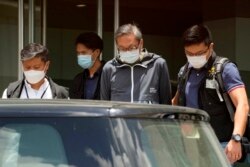 香港警方以涉嫌违反国安法拘捕壹传媒集团行政总裁张剑虹。(2021年6月17日)