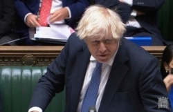 英国首相约翰逊在议会宣布英国实施针对北京冬奥会的外交抵制。(2021年12月8日)