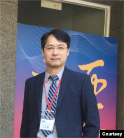 位于台北的政治大学东亚研究所所长王信贤。(照片提供:王信贤)