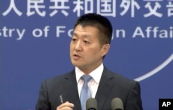 中国外交部发言人陆慷在北京的记者会上(2016年6月12日)