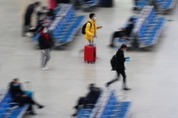 中国春节前的上海火车站不见往年春运的繁忙。(2021年1月28日)