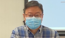 香港浸会大学政治及国际关系学系副教授陈家洛表示,民调结果反映大部份港人对新的选举制度感到抗拒 (美国之音/汤惠芸)