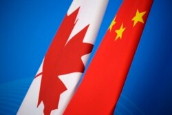 资料照:加拿大与中国国旗