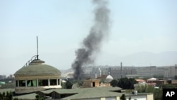Smoke rises next to the U.S. Embassy in Kabul, Afghanistan, Aug. 15, 2021.