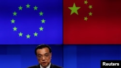 中国总理李克强2019年4月9日在出席中欧峰会后出席联合记者会(路透社)