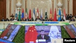 中国国家领导人习近平在塔吉克斯坦杜尚别举行的上海合作组织峰会上通过视频发表讲话。(2021年9月17日)
