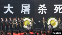 中国2018年12月13日举行祭奠南京大屠杀死难者活动(路透社)