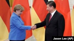 Канцлер Німеччини Анґела Меркель і президент Сі Цзіньпін у Пекіні
