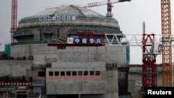资料照:广东省台山核电站一个正在兴建中的核反应堆。(路透社 2013年10月17日)