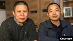 中国著名维权人士许志永(左)和丁家喜