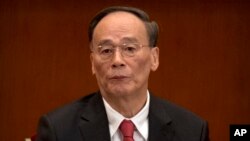 2017年10月18日,中纪委书记和政治局常委王岐山在中国共产党第十九次全国代表大会开幕式上。
