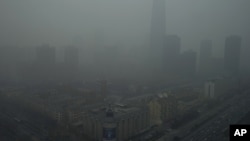 1月13日的北京,雾霾浓重,高楼看不清