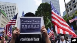 抗议者星期天(2019年9月8日)游行前往美国驻香港总领事馆。美联社摄