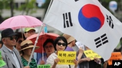 韩国民众2016年7月18日首尔集会,支持部署萨德