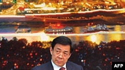 重庆市委书记薄熙来在一个记者会上(资料照片)
