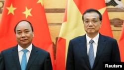 2016年9月12日中国总理李克强(右)和越南总理阮春福在北京出席签字仪式。