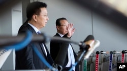 朝鲜副外相金桂冠(右)6月18日抵达北京。(照片来源:美联社)