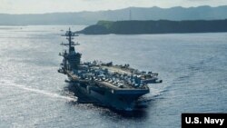 美军“罗斯福”号(USS Theodore Roosevelt)航母2020年5月21日驶离关岛,前往菲律宾海执行任务。