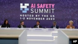 资料照:世界各国政要2023年11月出席在英国举行的人工智能安全峰会。(媒体联访照片)