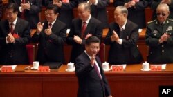 “习近平新时代中国特色社会主义思想”写入党章,成为中共行动指南