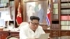 朝中社6月22日发布照片,显示金正恩正在仔细阅读特朗普的私人信函。