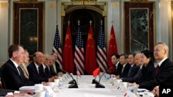 美国与中国高级官员2019年2月21日在华盛顿举行经贸磋商(美联社)