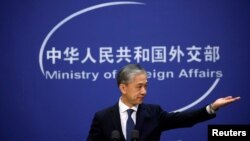 တရုတ်နိုင်ငံခြားရေး။ဌာန ပြောခွင့်ရ Wang Wenbin က ပေကျင်းသတင်းစာရှင်းလင်းပွဲတခုတွင် စကားပြောစဉ် (ဓာတ်ပုံ- Reuters)